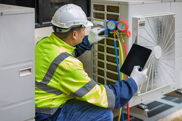 Professional Hvac technician working in Norman, OK